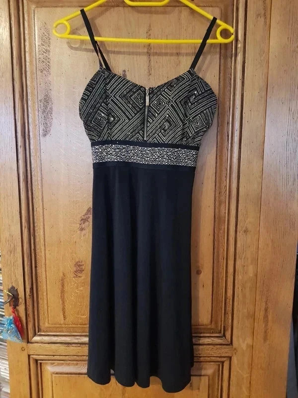 New black dress with golden rhinestones on the chest – photo 2
